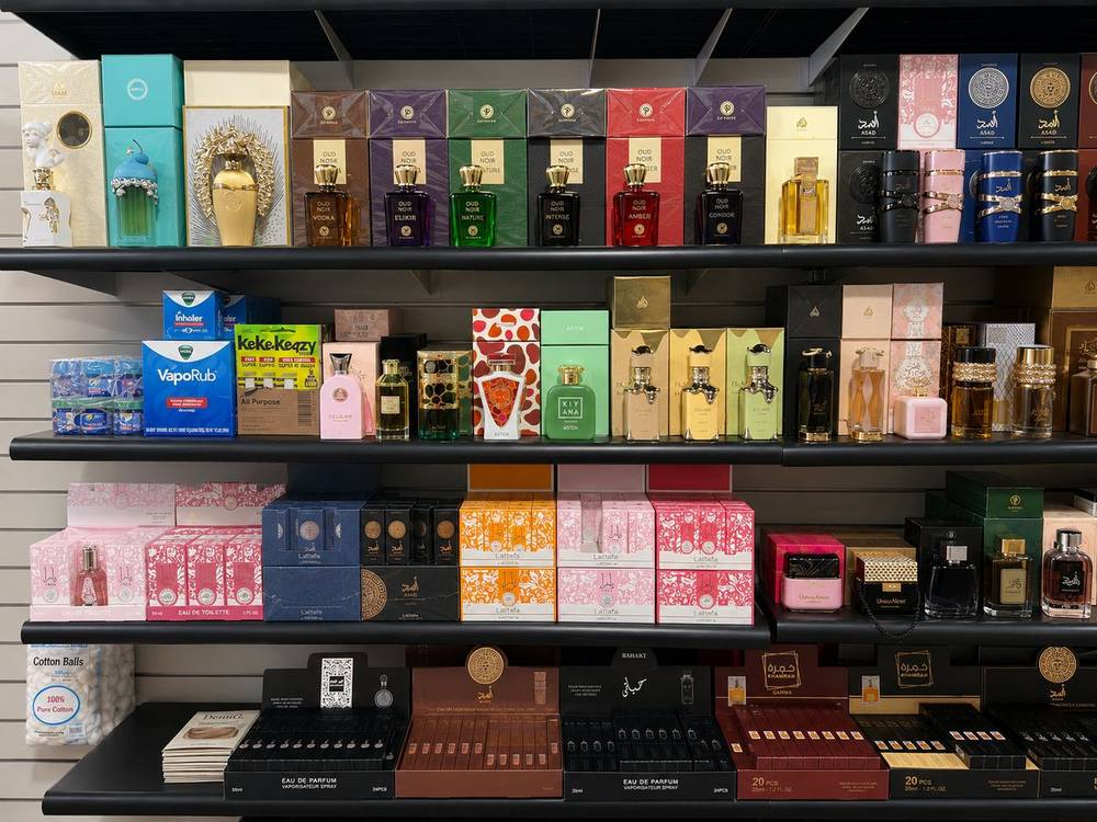 Arabic perfume display shelves at Allan Beauty Supply